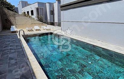 ÇEŞMEDE ENCORE LOFTDA EŞYALI DENİZ MANZARALI HAVUZLU KİRALIK 1+1