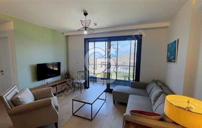 ÇEŞMEDE ENCORE LOFTDA EŞYALI DENİZ MANZARALI HAVUZLU KİRALIK 1+1