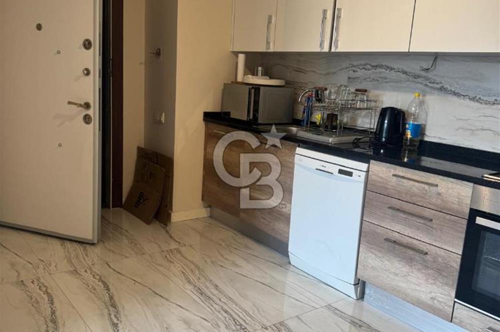 PENDİK AYDOSLAND SİTESİNDE SATILIK BALKONLU GENİŞ 1+1 DAİRE