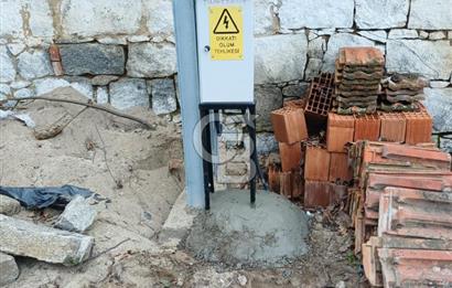 BERGAMA KOZAK YAYLASI ELEKTRİK SU ABONELİKLİ KONUT İMARLI ARSA