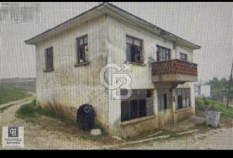Balikesir Eskimanyas'ta İçinde Ev ve Dukkani olan Satılık Arsa 