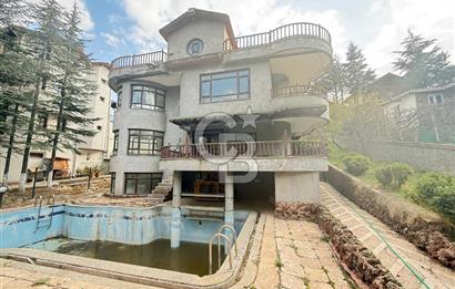 BAĞLUMDA ÇAMLARIN İÇİNDE DAİRE FiYATINA SATILIK HAVUZLU VİLLA