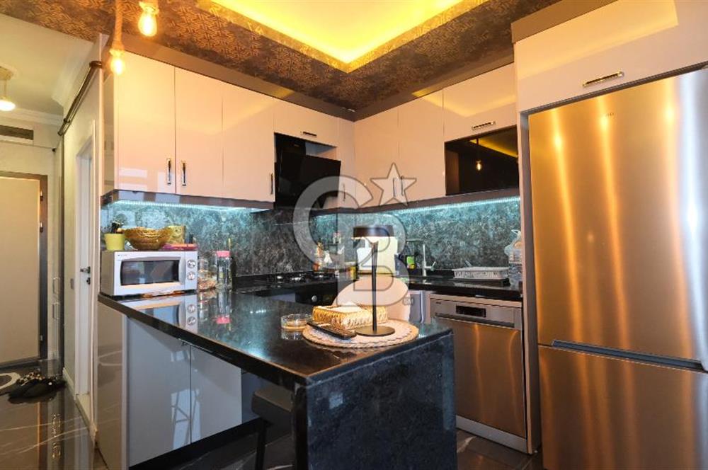 İNCEK'TE RESMİ KURUMLARA YAKIN SATILIK DAİRE