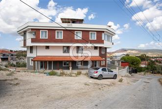 Foça Yenibağarasında Satılık 3+1 Bahçeli Dubleks Daire