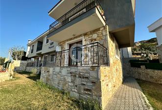 Foça Yenibağarası'nda Kiralık 2+1 Bahçe Katı Daire