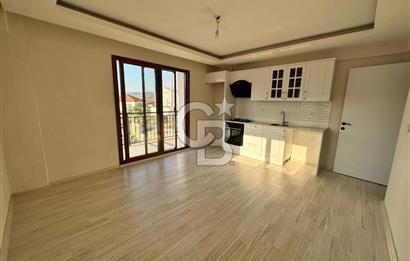 Foça Yenibağarası'nda Kiralık 2+1 Bahçe Katı Daire