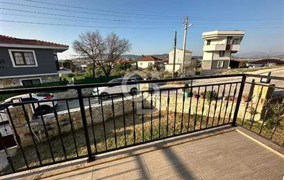 Foça Yenibağarası'nda Kiralık 2+1 Bahçe Katı Daire