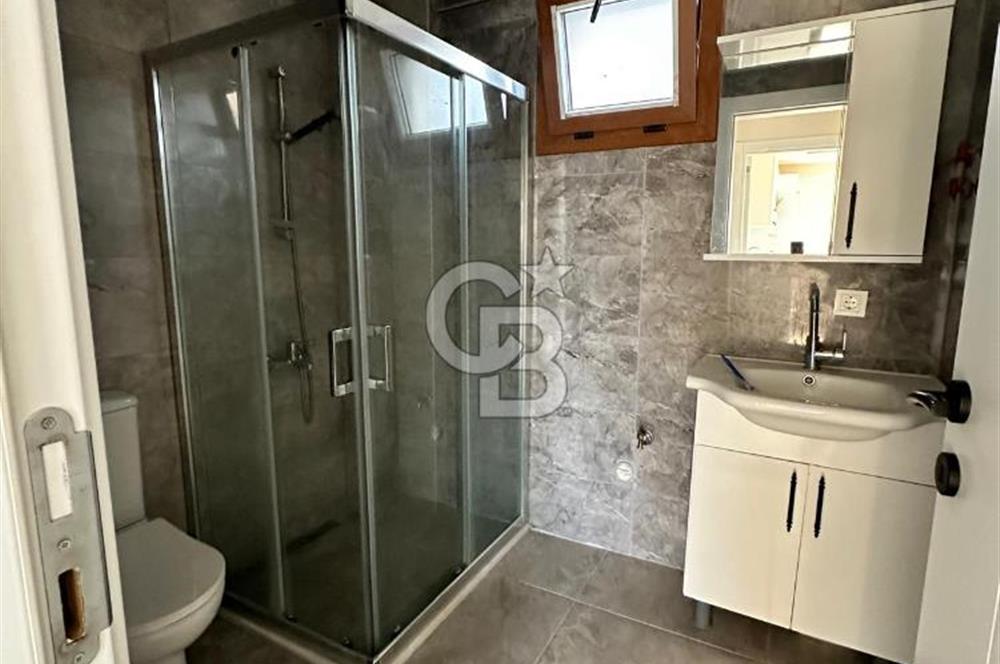 Foça Yenibağarası'nda Kiralık 2+1 Bahçe Katı Daire