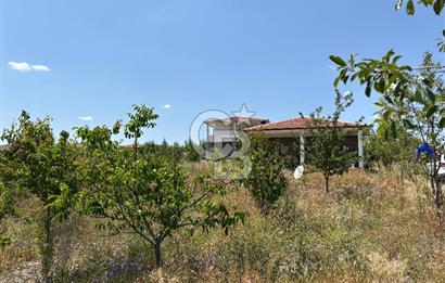 GÖLBAŞI MAHMATLIBAHÇEDE 1 DÖNÜM TARLA ÜZERİNDE SATILIK TAŞ EV