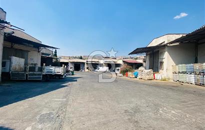 Bornova Kemalpaşa Caddesi Ambarlar Sitesinde Satılık Dükkan