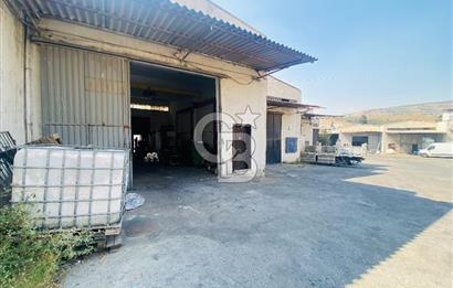 Bornova Kemalpaşa Caddesi Ambarlar Sitesinde Satılık Dükkan