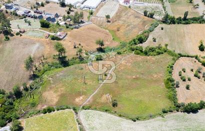 CB ARDENDEN KAŞ UĞRAR KÖYÜNDE 7146 M2 SATILIK TARLA