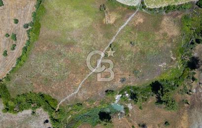 CB ARDENDEN KAŞ UĞRAR KÖYÜNDE 7146 M2 SATILIK TARLA
