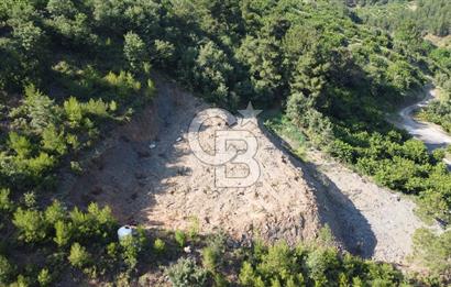 YENİKURUDERE DE YOLU AÇIK MANZARALI SUYU OLAN SATILIK ARAZİ 
