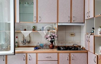 İZMİR KARŞIYAKA BOSTANLI'DA 2+1 GİRİŞ KATI BAHÇELİ SATILIK DAİRE