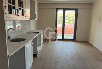 Foça Yenibağarasında Kiralık 1+1 Daire