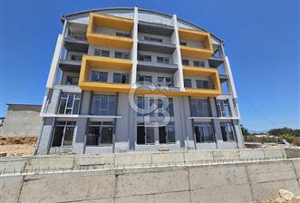 GÜZELYURT SOSYAL DONATILI HAVUZLU 1+1 FIRSAT DAİRE