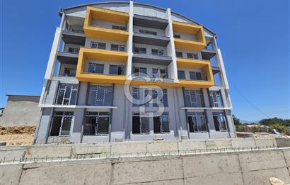 GÜZELYURT SOSYAL DONATILI HAVUZLU 1+1 FIRSAT DAİRE