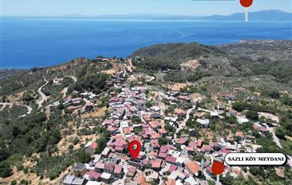 ÇANAKKALE AYVACIK SAZLI KÖY MERKEZİNDE MANZARALI SATILIK TAŞ EV