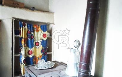 ALİ OVACIKLI'DAN HİSARLIK KÖYÜNDE İKİ KATLI TAŞ EV