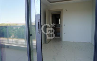 DALAMAN MERKEZ'DE HAVAALANI YOLU ÜZERİ 1+1 ULTRA LÜKS DAİRE