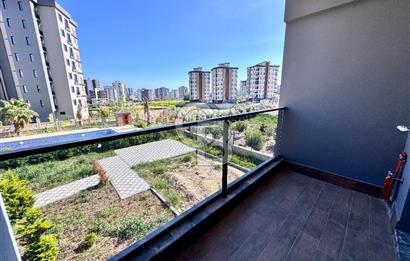 MEZİTLİ KUYULUK MAH. HAVUZLU SİTE İÇERİSİNDE SATILIK 1+1 DAİRE