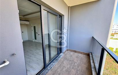 MEZİTLİ KUYULUK MAH. HAVUZLU SİTE İÇERİSİNDE SATILIK 1+1 DAİRE