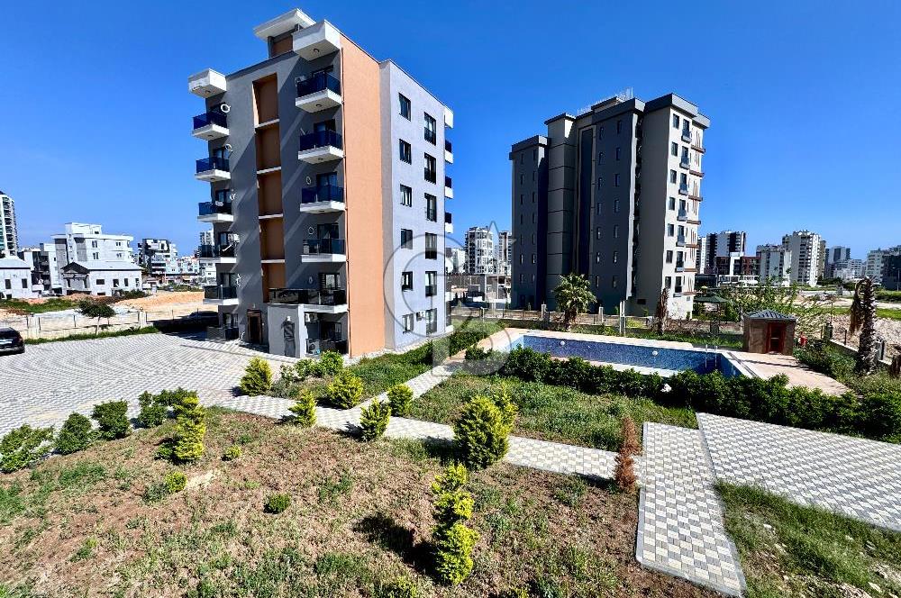 MEZİTLİ KUYULUK MAH. HAVUZLU SİTE İÇERİSİNDE SATILIK 1+1 DAİRE
