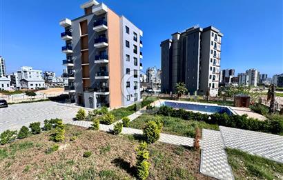 MEZİTLİ KUYULUK MAH. HAVUZLU SİTE İÇERİSİNDE SATILIK 1+1 DAİRE