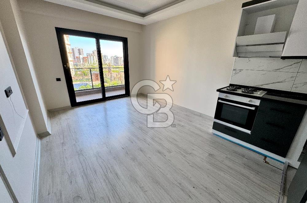 MEZİTLİ KUYULUK MAH. HAVUZLU SİTE İÇERİSİNDE SATILIK 1+1 DAİRE