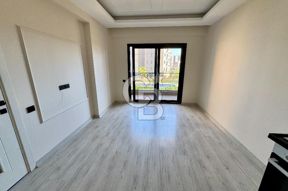MEZİTLİ KUYULUK MAH. HAVUZLU SİTE İÇERİSİNDE SATILIK 1+1 DAİRE