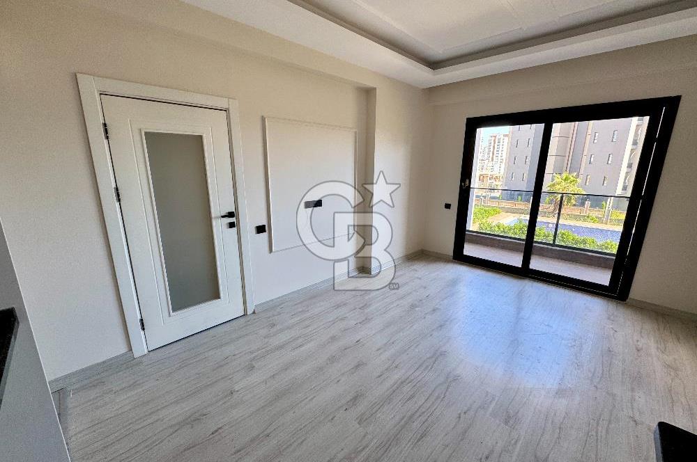 MEZİTLİ KUYULUK MAH. HAVUZLU SİTE İÇERİSİNDE SATILIK 1+1 DAİRE