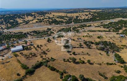EZİNE KÖRÜKTAŞI'NDA DENİZE 5.5 KM BOZCAADA'YA YAKIN, YATIRIMLIK TARLA