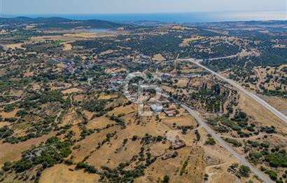 EZİNE KÖRÜKTAŞI'NDA DENİZE 5.5 KM BOZCAADA'YA YAKIN, YATIRIMLIK TARLA
