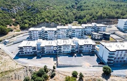 KUŞADASINDA DOĞA İLE İÇ İÇE HARİKA PROJEDE SATILIK 1+1 GİRİŞ KATI DAİRE