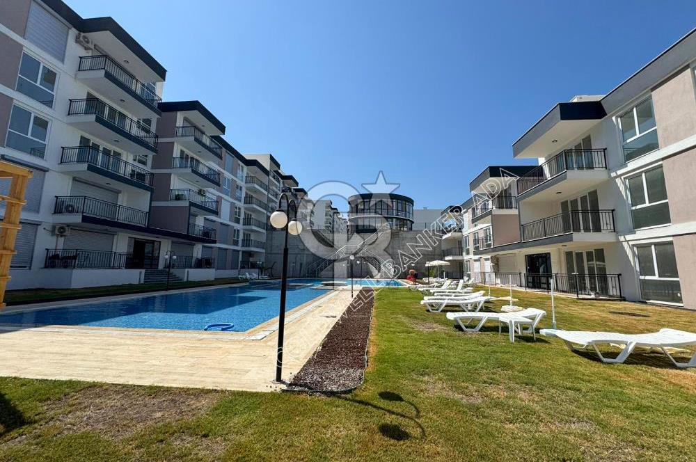 KUŞADASINDA DOĞA İLE İÇ İÇE HARİKA PROJEDE SATILIK 1+1 GİRİŞ KATI DAİRE