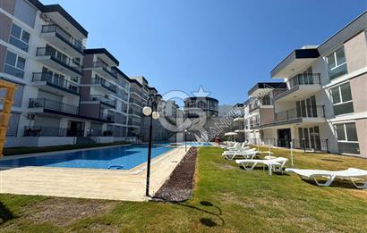KUŞADASINDA DOĞA İLE İÇ İÇE HARİKA PROJEDE SATILIK 1+1 GİRİŞ KATI DAİRE