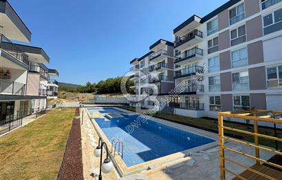 KUŞADASINDA DOĞA İLE İÇ İÇE HARİKA PROJEDE SATILIK 1+1 GİRİŞ KATI DAİRE