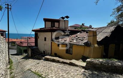 TAŞBAŞI GİRİŞİNDE DENİZ MANZARALI 3 PARSELLİ KİRALIK EV VE ARSA
