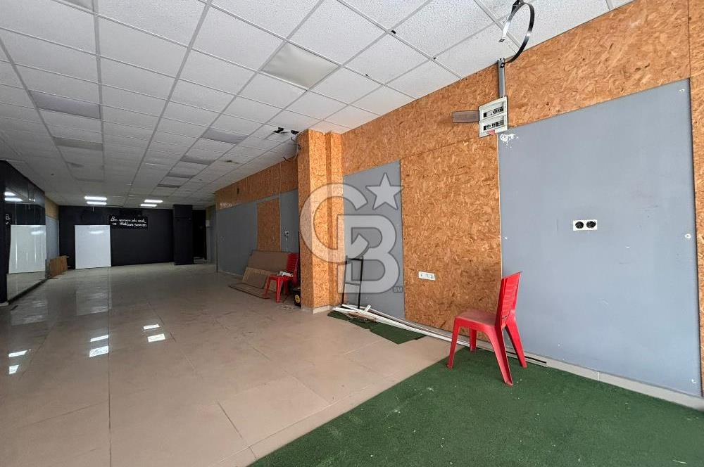 GAZİEMİRDE BELEDİYE ARKASINDA CADDEYE 7 M CEPHELİ SATILIK DÜKKAN