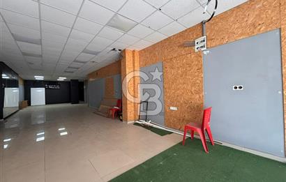 GAZİEMİRDE BELEDİYE ARKASINDA CADDEYE 7 M CEPHELİ SATILIK DÜKKAN