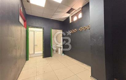 GAZİEMİRDE BELEDİYE ARKASINDA CADDEYE 7 M CEPHELİ SATILIK DÜKKAN