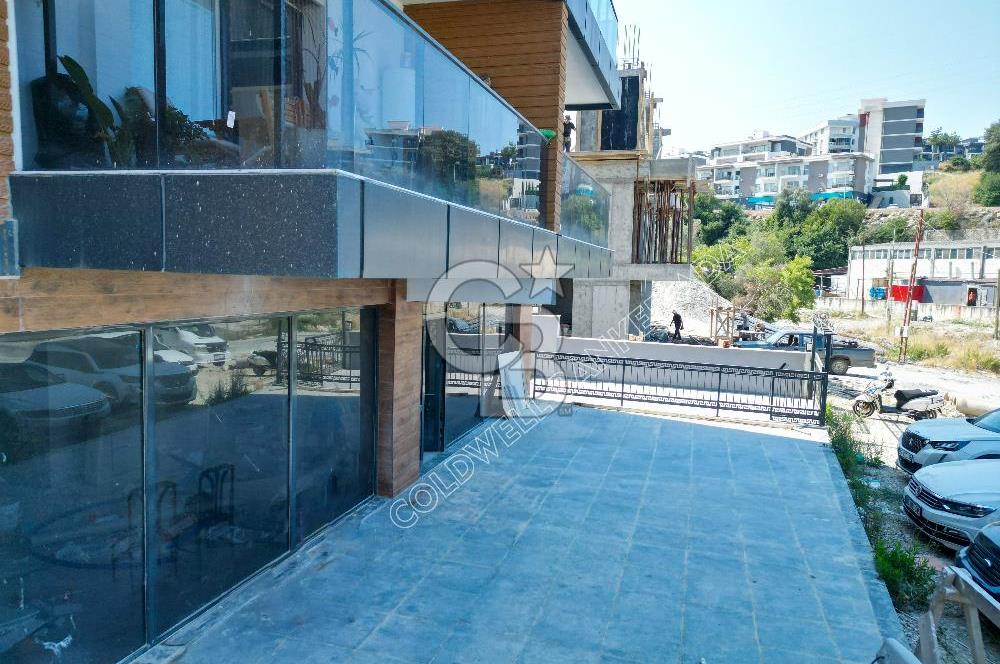 Kuşadası’nın Gelişen Bölgesi Kirazlı Yolu Üzerinde, Cadde Cepheli, Yüksek Tabela Değerine Sahip Sıfır Dükkan Fırsatı!