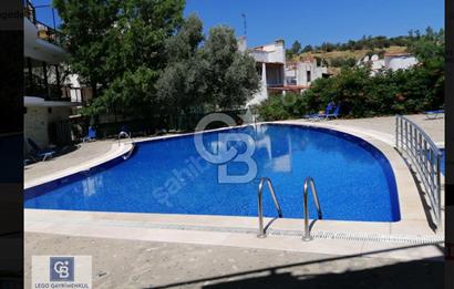 Foça Olivia Villagede deniz manzaralı Satılık 1+1