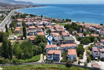 PLAJA YÜRÜME MESAFESİNDE ALTINOLUK NARLI'DA 2+1 EŞYALI DAİRE!