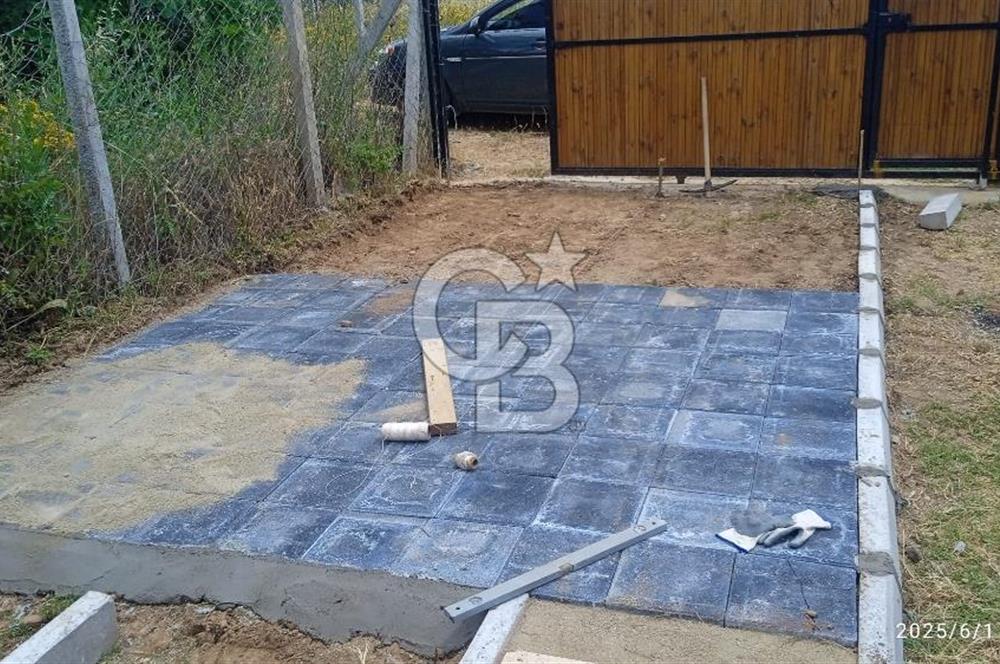 KEMALPAŞA CUMALİ DA İCİNDE EV BULUNAN SATILIK ZEYTİNLİ TARLA