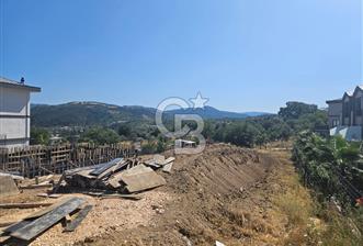 GÜMÜŞTEPE DE HARİKA KONUMDA ALT YAPI SORUNU OLMAYAN ARSA