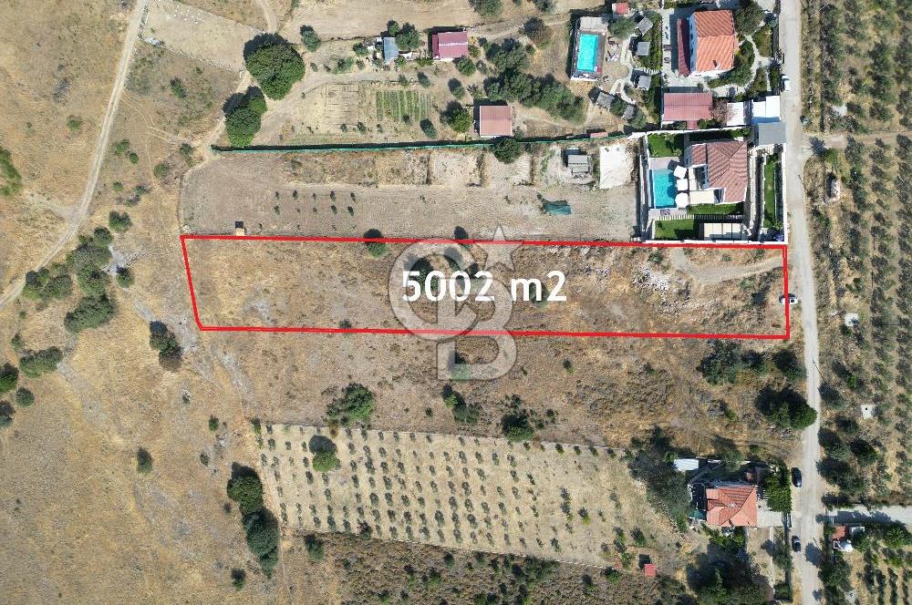 FOÇA YENİBAĞARASINDA DOĞA İÇİNDE SATILIK YAPI RUHSATLI ARSA