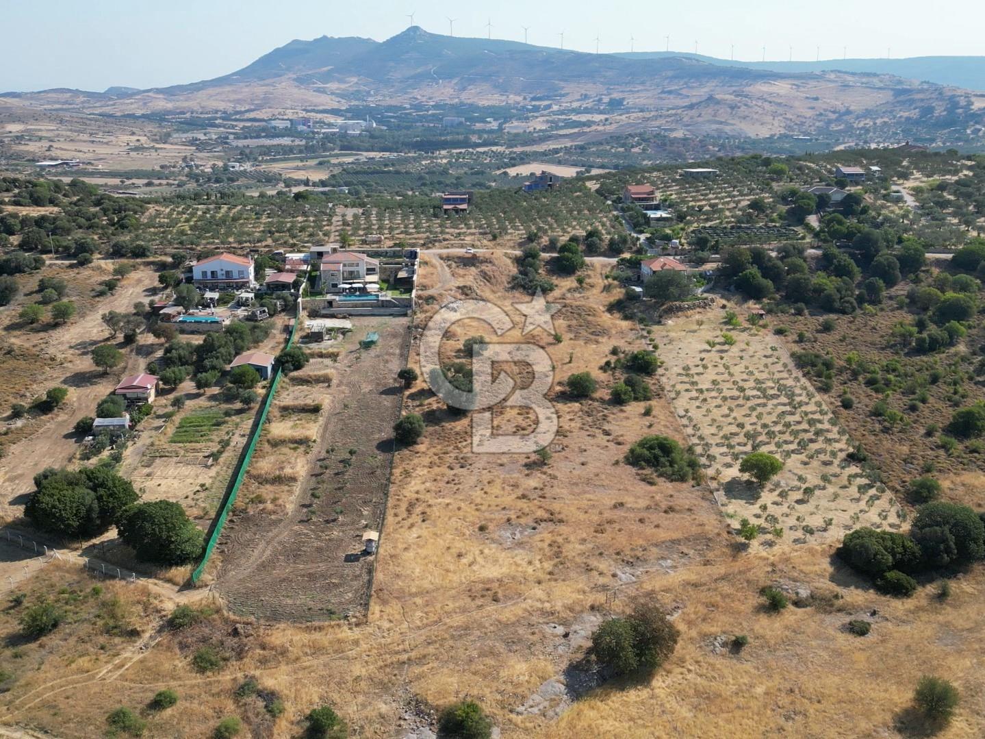FOÇA YENİBAĞARASINDA DOĞA İÇİNDE SATILIK YAPI RUHSATLI ARSA