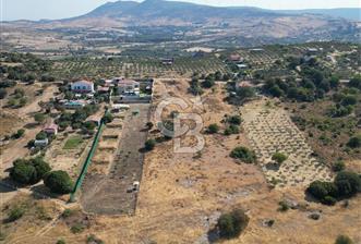 FOÇA YENİBAĞARASINDA DOĞA İÇİNDE SATILIK YAPI RUHSATLI ARSA